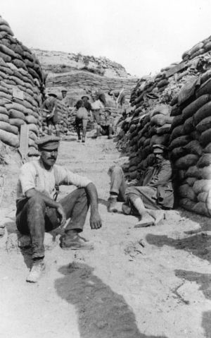 Men resting in the main trench leading to Quinn's Post